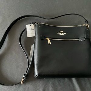 Coach Black leather with gold metal Rowan crossbody